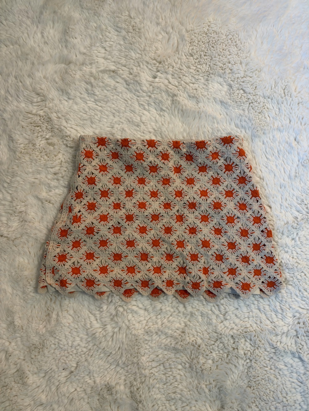 Mango Cream Crochet Mini Skirt with Orange Sunburst Detail